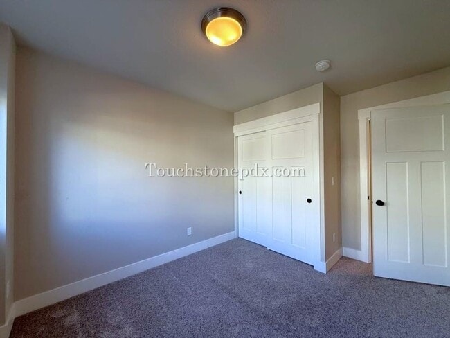 Building Photo - Modern Open Concept 3 Bedroom Home with Balcony and Attached Garage