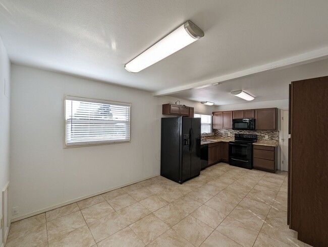 Building Photo - Updated, All Electric, Three Bedroom with ...