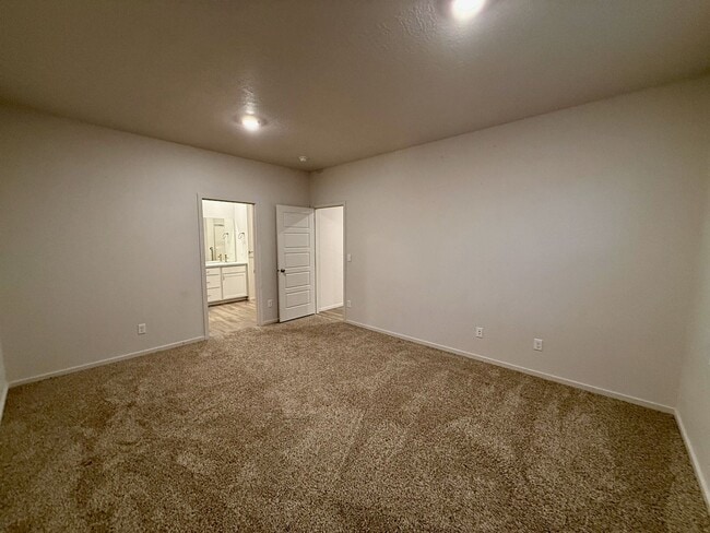 Building Photo - New Construction 4 Bed Mead School District Rancher w/ Fully-Fenced Yard and Attached Garage!