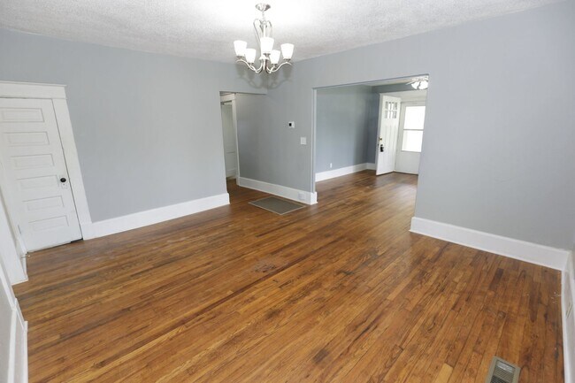 Building Photo - Spacious 4-Bedroom Home with Modern Upgrad...