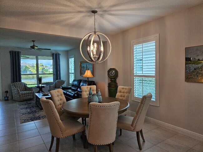 Building Photo - 9985 SW Trumpet Tree Cir
