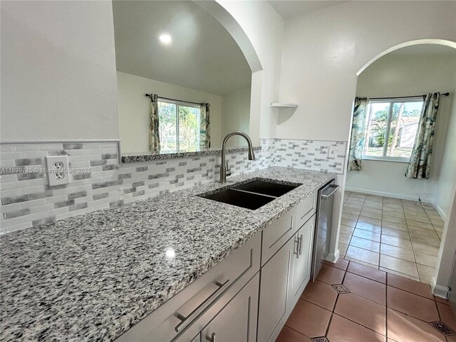 Building Photo - 6452 Royal Palm Beach Blvd