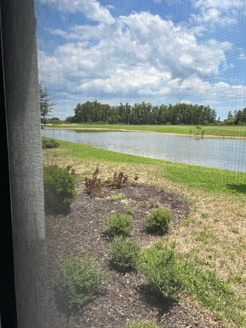 Lanai looking out to Pond and Golf Course hole 15 - 6023 Ellerston Way