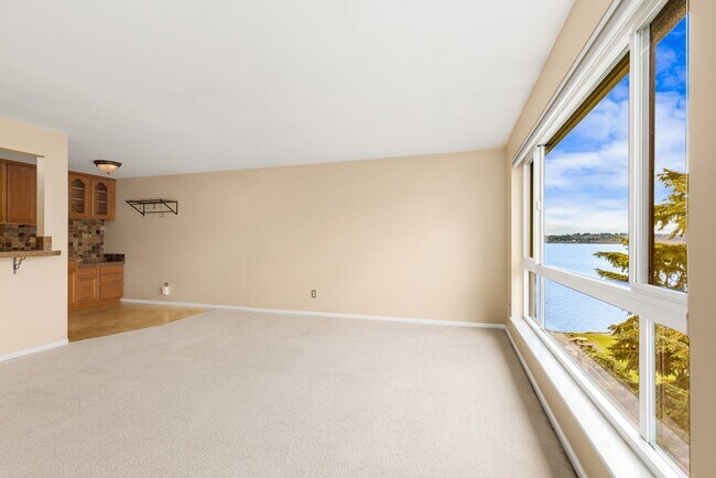 Building Photo - Waterfront Serenity: 1 Bedroom 1 Bathroom Luxury Living with Dock Access