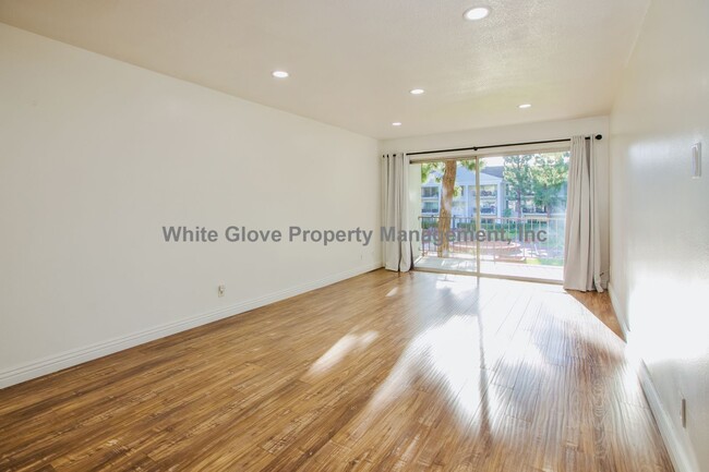 Building Photo - Updated Newport Beach Condo in Gated Versailles Community with Resort-Style Amenities