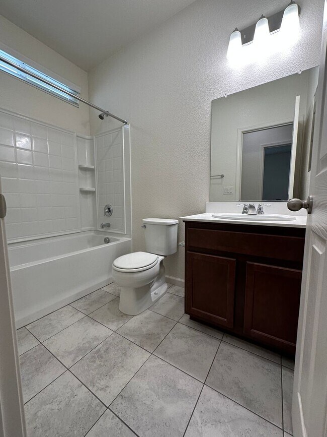 Building Photo - Stunning 4 Bedroom, 3 Bath Gated Community W/ Solar