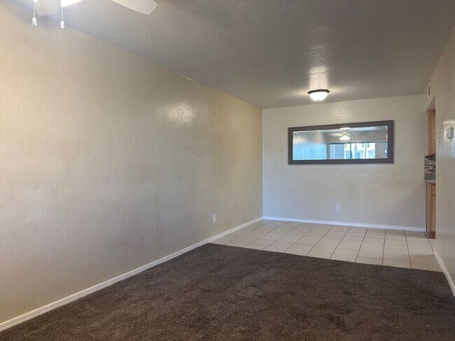 Building Photo - Sun-Drenched 1-Bedroom Condo in Central Tucson | Gated Community with Pool
