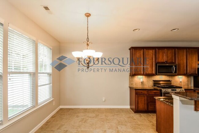 Building Photo - Townhome | 3rd Floor Bonus Room | Fenced Y...