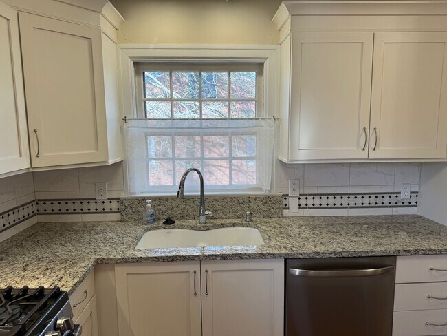 Building Photo - East AVL - Newly Renovated Older Home Featuring Garage and Bonus Room