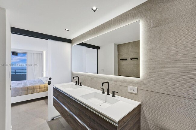 Building Photo - 5555 Collins Ave