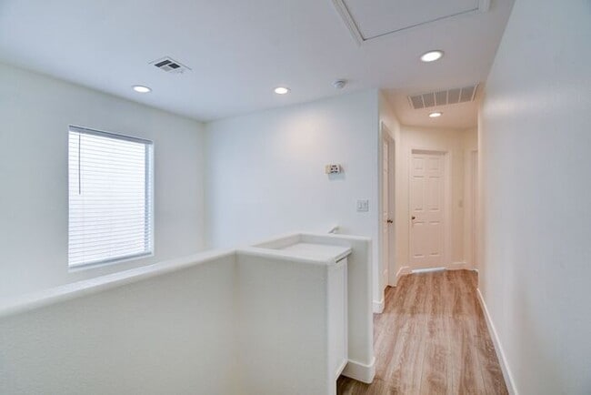 Building Photo - Great home with 4 bedrooms, 2.5 baths. New Floors Paint and Countertops.