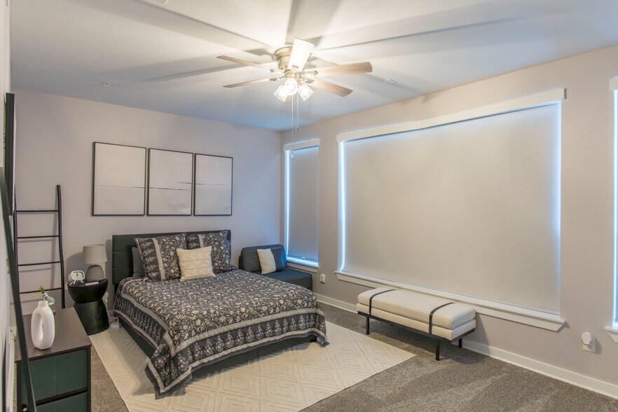 Master bedroom with remote blackout shade - 1211 Beaconsfield Ln
