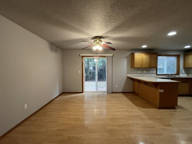Building Photo - 3-Bed Home with Fireplace, Fenced Backyard, 2 Car Garage & Front Patio!