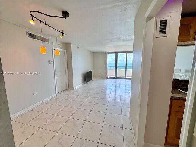 Building Photo - 5555 Collins Ave