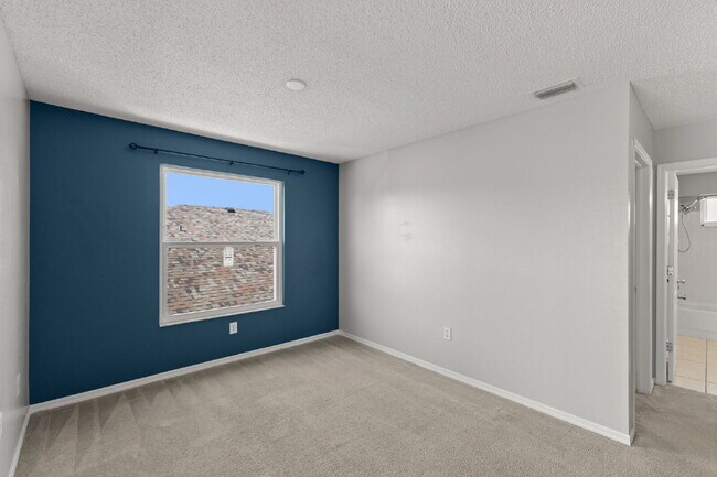 Building Photo - "Spacious 4-Bedroom Gem with 2.5 Baths in ...