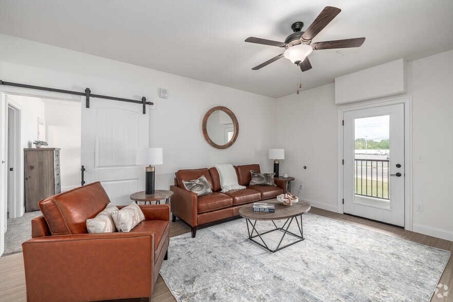 2BR, 2BA - 1,250SF - Living Room - The Residences at LeMoyne Manor