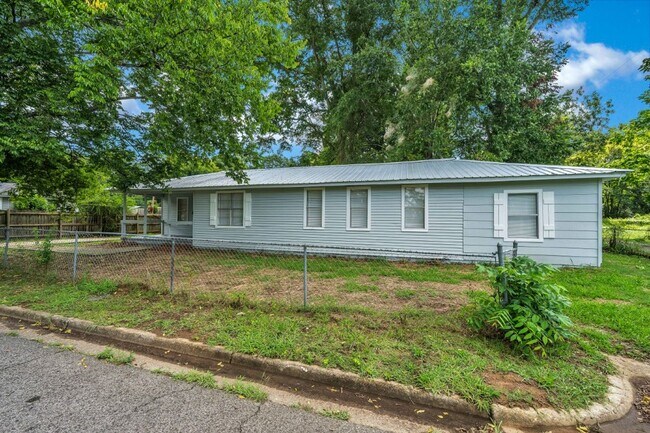 Building Photo - RARE 4BR Bessemer Beauty – Huge Space, Modern Updates & Low Move-In Costs!