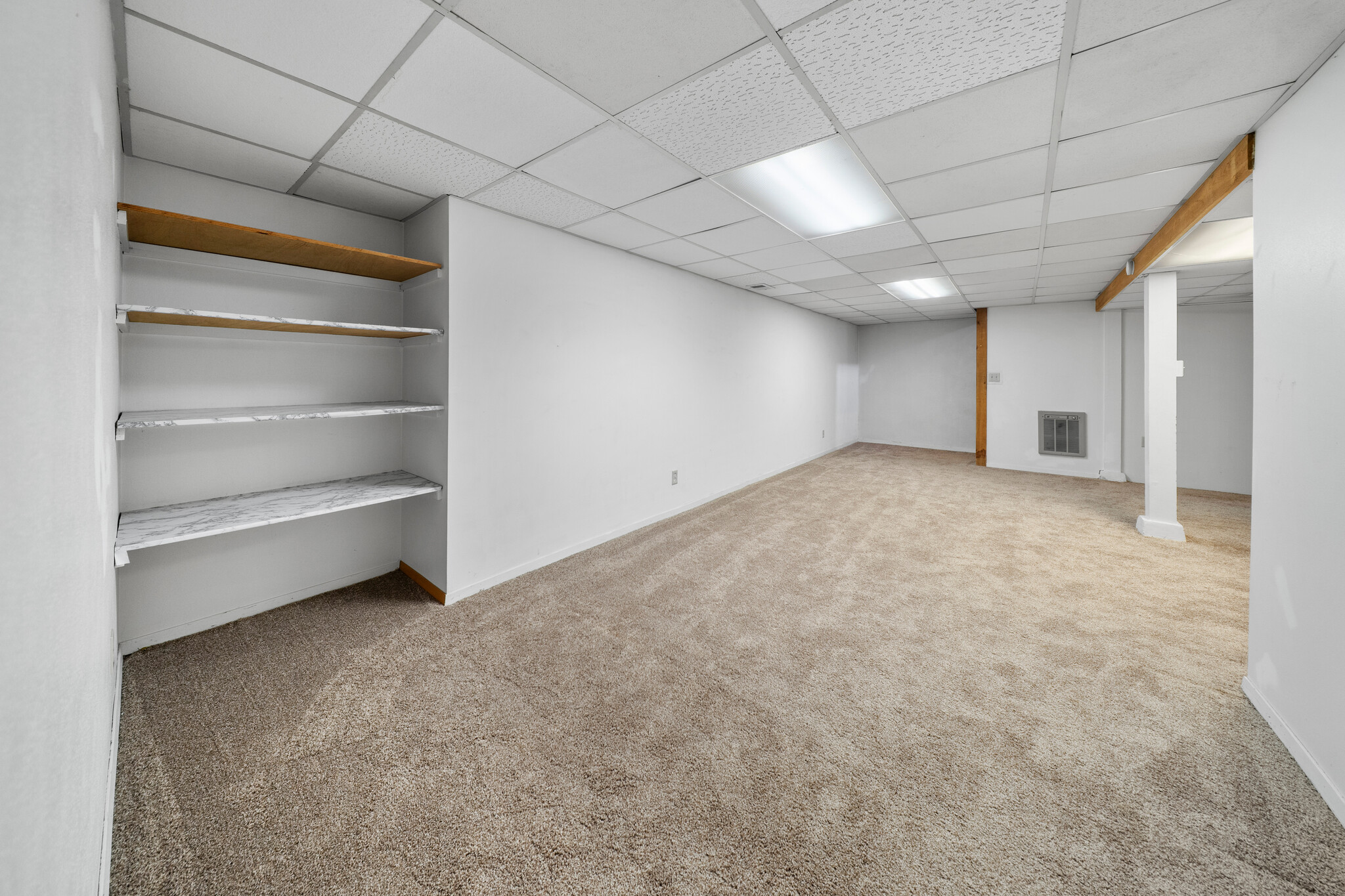 Lower living room with storage - 2405 W 28th St