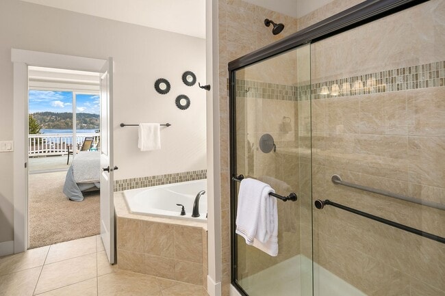 Building Photo - Water Views| Expansive Deck | Flexible Living Spaces