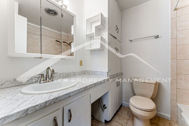 Building Photo - Spacious Home with Fenced Yard and Central AC