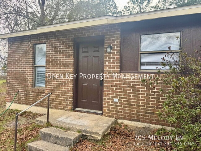 Building Photo - 709 Melody Ln