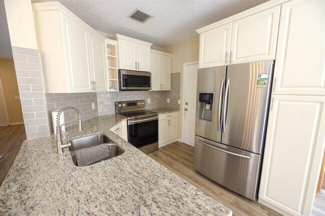 Building Photo - 6006 Plum Isle Way