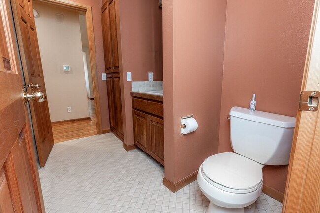 Building Photo - Private river access and stunning views from this home on Harmon Blvd! + Bonus Room