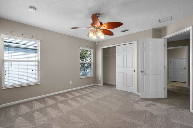 Building Photo - 4/2.5/2 Woodland Lakes Preserve Available Now