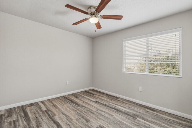 Building Photo - Gated Community Home with Solar Panels & All Appliances Included