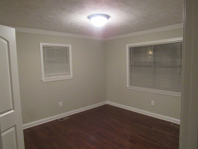 Building Photo - 4 Bedroom, 3 Bath Basement Ranch with Coun...