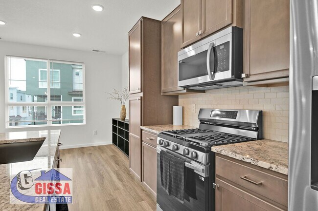 Building Photo - 1.5 year old townhome with 3 bedrooms, 2 1/2 bathrooms, 2-car garage at Victory Ridge available NOW!