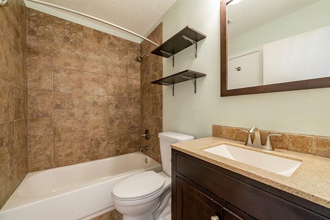 Clean Modern Bathrooms with washer and dryer included. - 13631 Garden Grove Ct