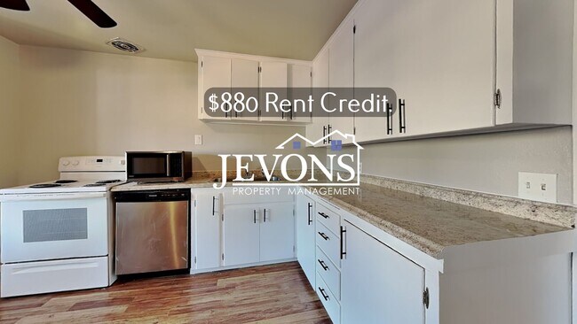 Building Photo - $880 Rent Credit - Inviting 2-bedroom 4-pl...