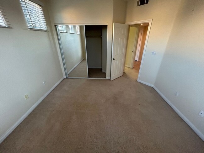 Building Photo - ADORABLE 2 BEDROOM 2 BATHROOM CONDO LOCATED IN A GATED COMMUNITY