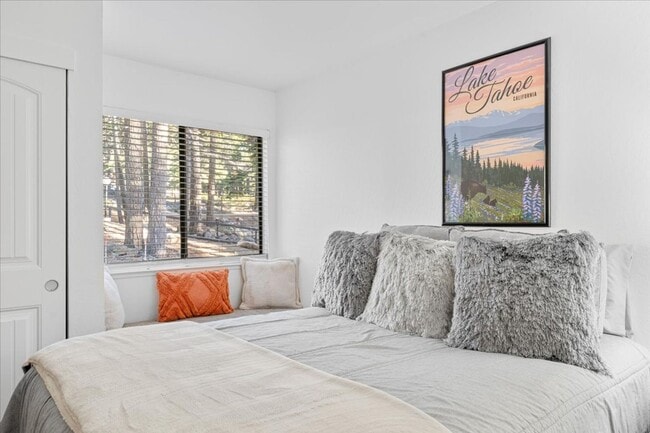 Building Photo - SKI LEASE:  Updated Townhome in Wooded, Central North Lake Location!