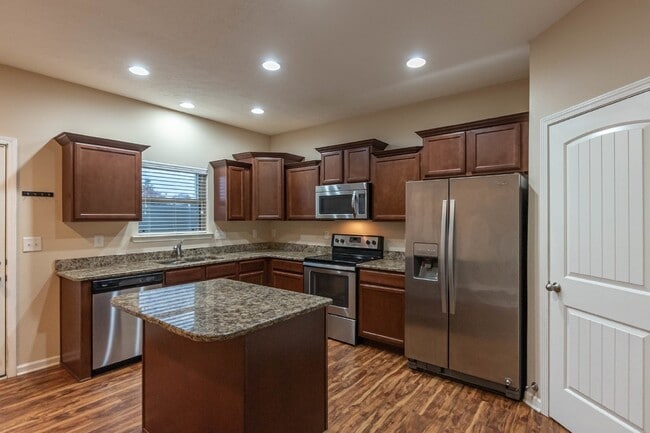 Building Photo - Available Now! Wonderfull Location! 2/2.5 Townhome w/ Upgrades.