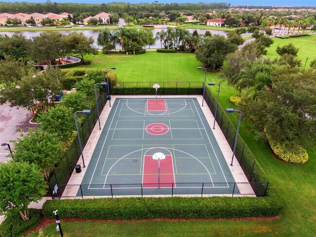 Building Photo - Gorgeous 3/2 Mediterranean Villa with Waterfront Screened Patio and 2-Car Garage in the Prestigio...