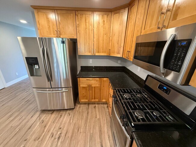 Building Photo - NEW PHOTOS! Two-level home located in Coff...