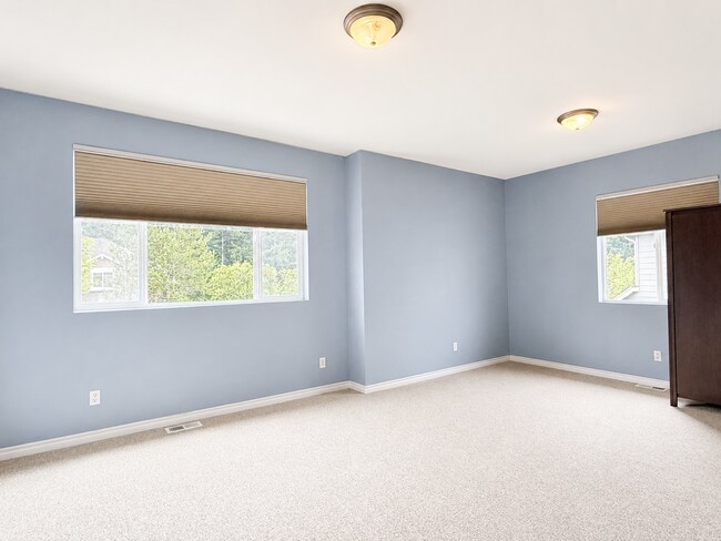 Building Photo - Spacious 4-Bedroom Home with Bonus Room, Trex Deck & Pergola in Prime Maple Valley