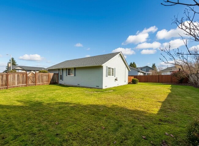 Building Photo - Sunny Rambler on Corner Lot with Large Fenced Yard & Deck