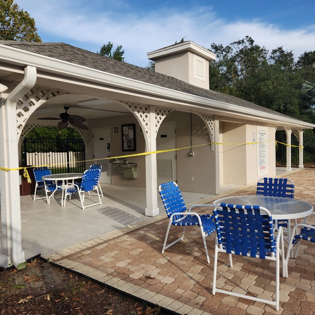 Have lunch at the pool. Plenty of tables and chairs - 15623 Stable Run Dr