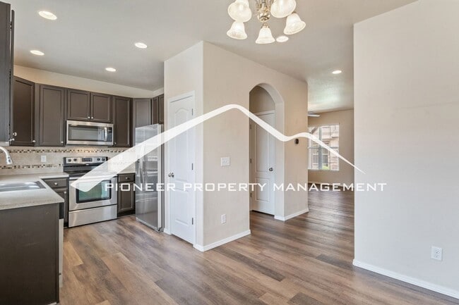 Building Photo - Low-Maintenance Living with Mountain Views! 3BR Townhome, 2-Car Garage & A/C