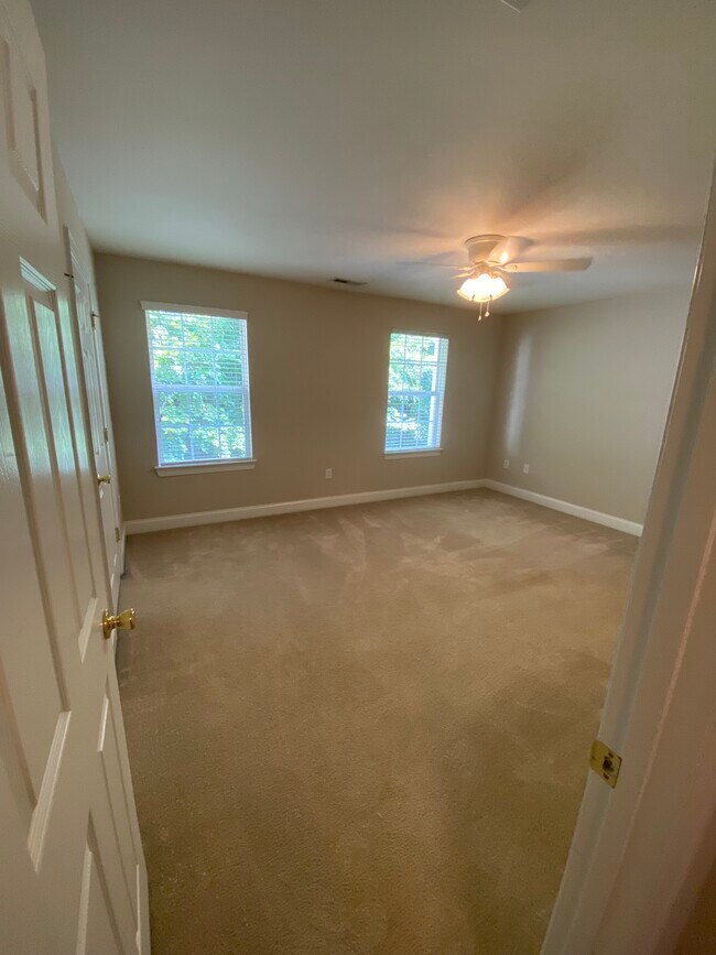 This is the master bedroom. 2 bright windows and 2 big closets! - 137 High Ridge Rd