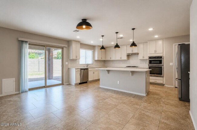 Building Photo - 12108 W Range Mule Dr