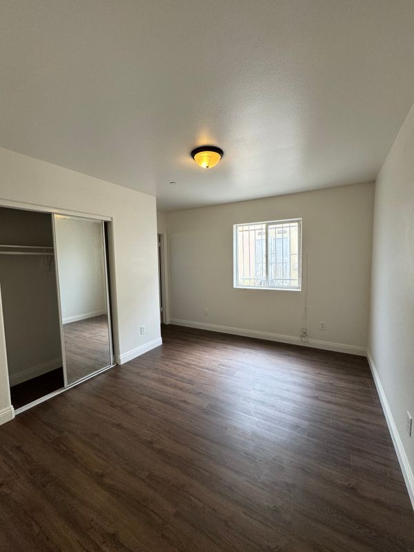 Building Photo - 7112 S Denker Ave