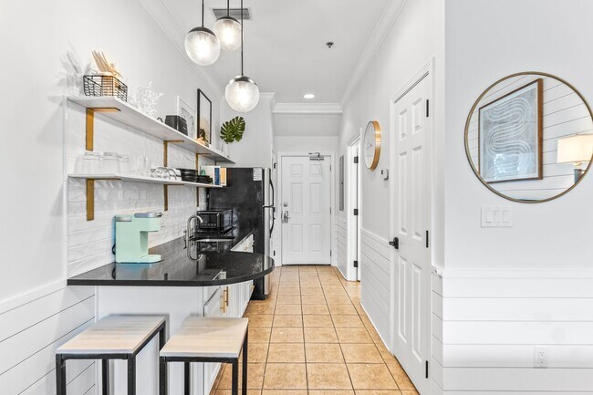 Building Photo - Available now.  Cute Furnished Studio Cond...