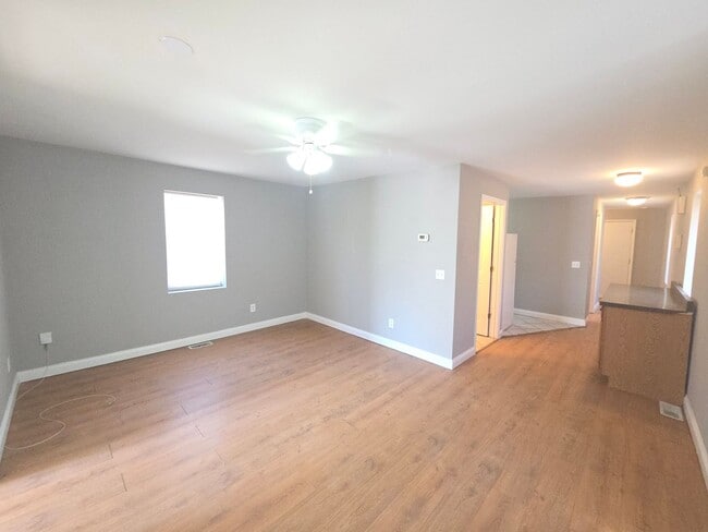 Building Photo - Single Family House with finished basement, garage, and backyard!