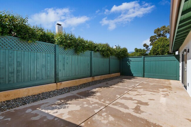 Building Photo - Beautifully redone Spanish duplex in peaceful and centrally-located Hidden Valley!