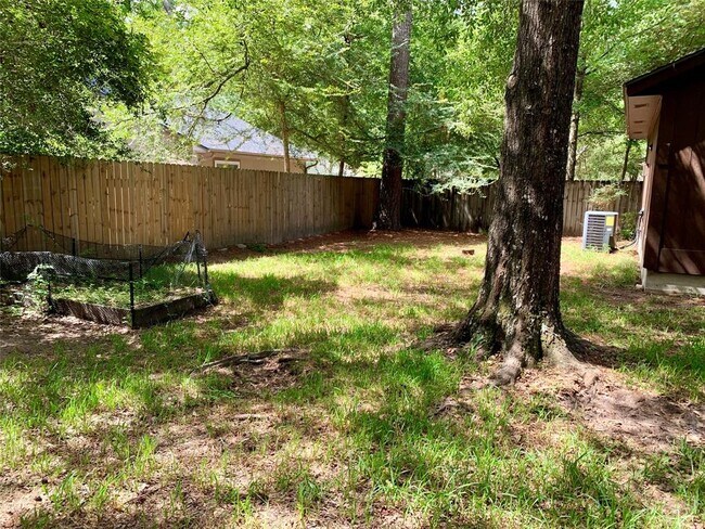 Building Photo - 22 N Wavy Oak Cir