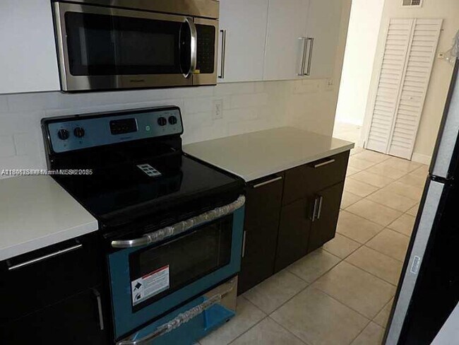 Building Photo - 10500 SW 155th Ct